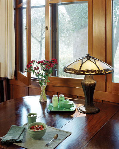 
Bill takes his morning calls and coffee at a small table in the warm kitchen overlooking the organic orchard and Ojai Valley below.
